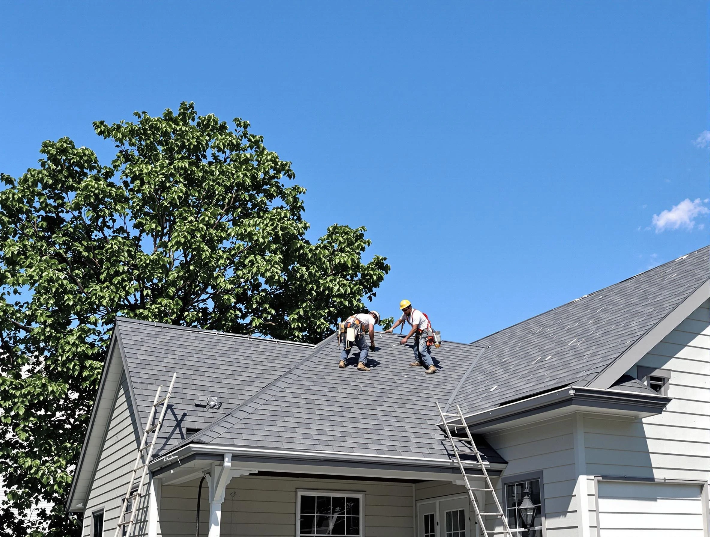 Rocky River Roofing Company crew finalizing a roof installation in Rocky River, OH
